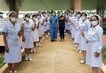 Thailand Reports First Day Without New Virus Case Nurses bid farewell to a patient who recovered from coronavirus in Krabi province on May 12, 2020.