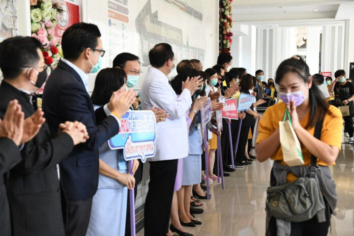 A woman is discharged from a state quarantine facility in Bangkok on April 16, 2020.