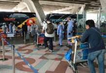 9 More Thais in State Quarantine Found With COVID-19 Thai returnees depart to a state quarantine facility on April 16, 2020.