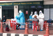Following China’s Pattern, Thailand Sees Rise in Imported Cases Thai returnees get a COVID-19 test on May 21, 2020 at Sadao border checkpoint.