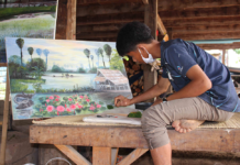 Orphaned Teen Paints Landscapes of His Town for College Money