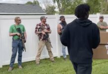Armed Bystanders Watch Floyd Protesters March in Indiana