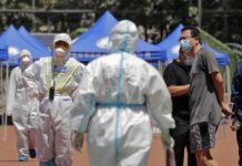 Beijing Reinstates Coronavirus Controls as Cases Rise Again