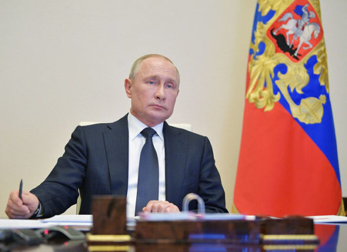 Russian President Vladimir Putin attends a meeting on measures to fight the spread of the COVID-19 via teleconference at Novo-Ogaryovo state residence outside Moscow, Russia, on April 28, 2020. Photo: Sputnik via Xinhua