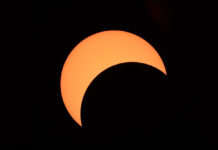 Partial Solar Eclipse To Darken Bangkok This Month A partial solar eclipse is seen at an observatory in Chachoengsao province on December 26, 2019. Photo: National Astronomical Research Institute