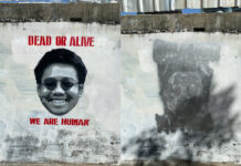 Security Officers Take Down Mural, Posters of Missing Activist Photo: @headachestencil / Twitter