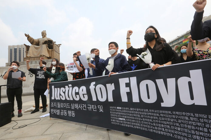 South Korean protesters stage a protest over the death of George Floyd near the U.S. embassy in Seoul on June 5, 2020. Photo: Ahn Young-joon / AP