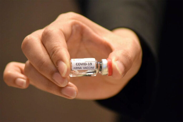 A vial of prototype COVID-19 vaccine is shown to the media on June 22, 2020.