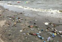 Trash Dumped by Bangkokians Washes Up on Bang Sean Beach
