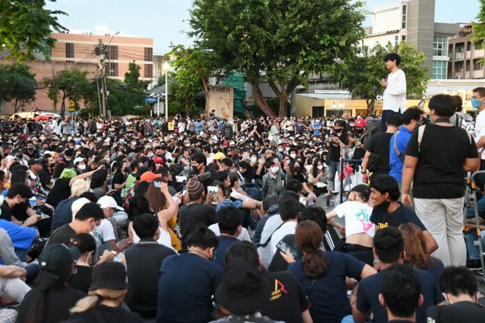 Protesters listen to speeches at a rally on July 18, 2020.