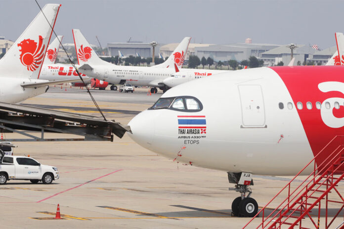 A file photo of Thai Lion Air and Thai AirAsia X aircrafts at Don Mueang International Airport. A file photo of Thai Lion Air and Thai AirAsia X aircrafts at Don Mueang International Airport.