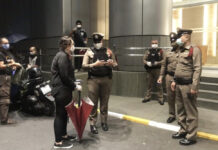 No More VIP Treatment? ‘EU Diplomat’ Tries to Skip Quarantine Police officers talk to the diplomat on July 16, 2020.