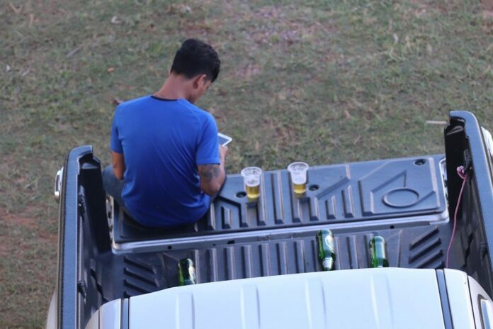 A man drinks beer in Kalasin province on June 7, 2020.