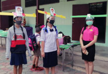 Little Justice Bao? Reopened Schools Get Creative in Pandemic Students and teachers wear face shields based on a headwear worn by ancient Chinese scholars at Baan Pa Maud School in Chiang Mai province.