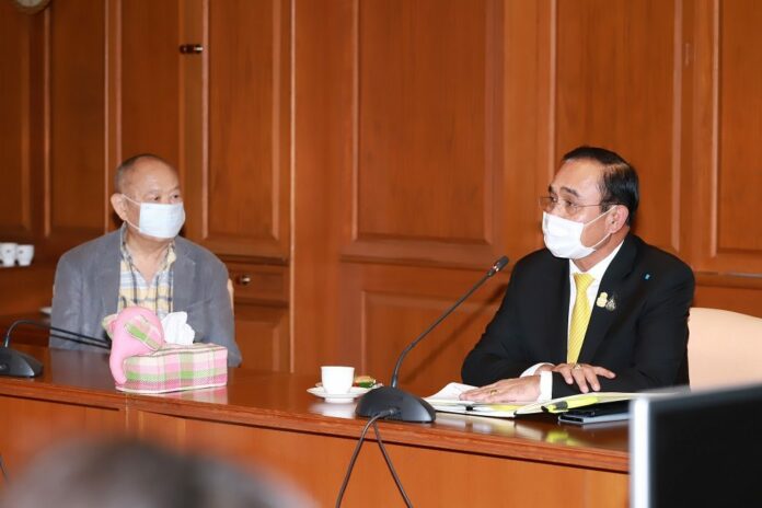 Matichon Group president Khanchai Boonparn and Prime Minister Prayut Chan-o-cha on July 10, 2020.