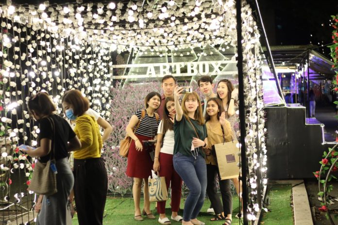 Visitors at Artbox take a selfie on Aug. 29, 2020, two days before the market closes permanently. Photo: Artboxthailand / Facebook