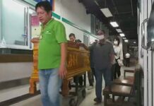 Boss Red Bull: Foul Play Not Ruled Out in Witness’ Death A coffin carrying Jaruchart Mardthong's body is wheeled to a forensic investigation on Aug. 3, 2020.