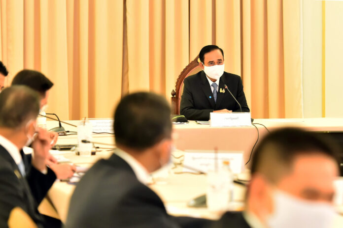 PM Prayut Chan-o-cha chairs a government's pandemic response center meeting on May 15, 2020.