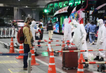 No Virus Found On Thais In Contact with Infected Malaysian Health officials disinfect luggages at Suvarnabhumi Airport on Aug. 13, 2020.