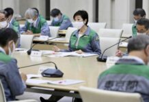 Tokyo To Lower Virus Alert Amid Dwindling Infections