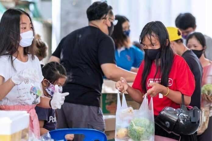 A file photo of people wearing masks in public space. A file photo of people wearing masks in public space.