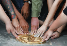 Protesters Reinstall Plaque Symbolizing Democracy