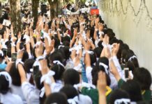 Amnesty Reveals Systematic Suppression of Child Protesters Students join an anti-government protest in front of the Ministry of Education in Bangkok on Aug. 19, 2020.