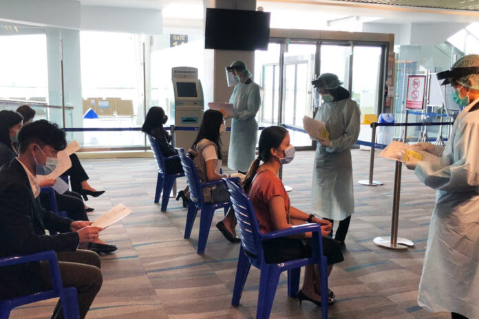 Officials take part in a health screening drill at Phuket International Airport on Sept. 8, 2020.