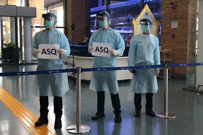 Phuket airport staff test a temperature screening device on Sept. 8, 2020, in anticipation of a partial reopening for tourism.