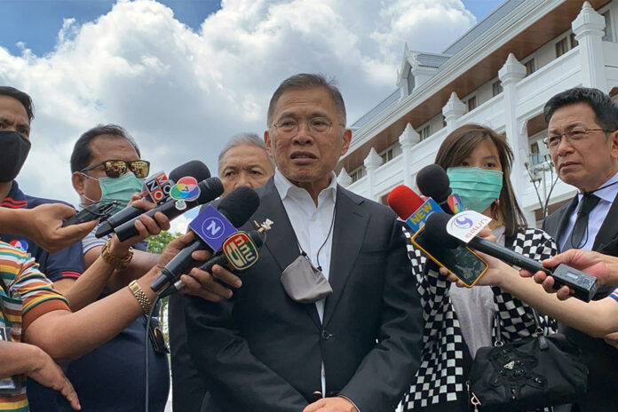 Watana Muangsook speaks to reporters after the verdict on Sept. 24, 2020.