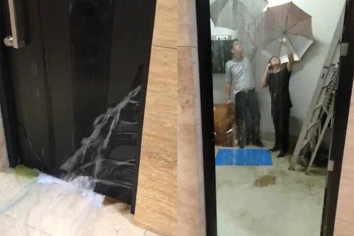 Water leaking from a room inside the parliament building on Sept. 1, 2020. Water leaking from a room inside the parliament building on Sept. 1, 2020.