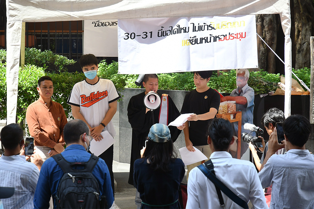 Members of the Thammasat Graduates of the People speak to the crowd during a rehearsal day on Oct. 23, 2020.