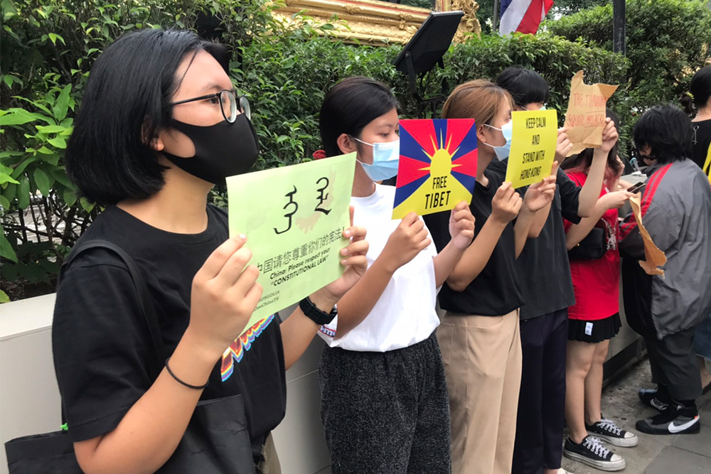 Placards supporting the Chinese Mongols and Tibetan people.