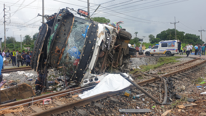 The wreckage of a bus that collided with a train on Oct, 11, 2020 in Chachoengsao, killing 18.