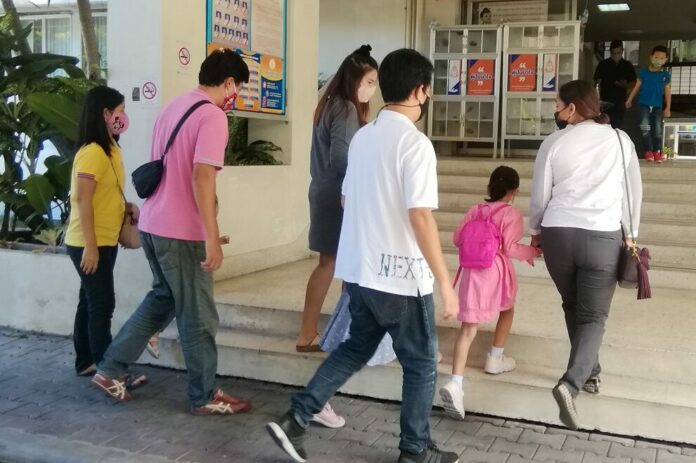 Parents of students at Sarasas Witaed Romklao School seen on Oct. 1, 2020.