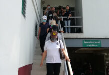 Teachers Accused of Hitting Children Freed on 8,000-Baht Bond Suspects being brought to the court by police on Oct. 6, 2020.