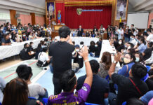Sarasas School Violence: Victims’ Parents to File Class-Action Suit Parents raise their hands to ask questions during a meeting at Sarasas Witaed Ratchaphruek School on Sept. 29, 2020.