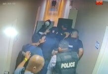 American Turns Gun On Himself After Rampage in Pattaya A still from security camera footage shows police commandos approaching the suspect’s condominium room on Nov. 3, 2020.
