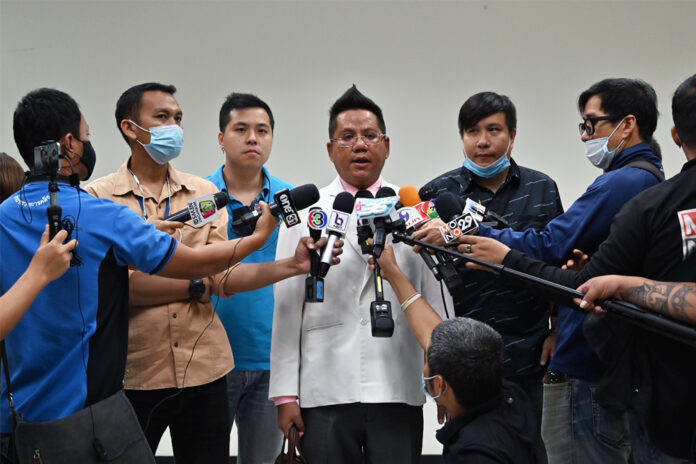 Lawyer Ronnarong Kaewpetch speaks to reporters after the arbitration hearing on Nov. 10, 2020.