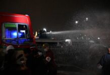 Protesters Defy Police Water Cannons to Deliver Royal Letters