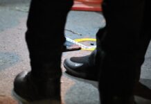 Shots Fired, Explosive Thrown at Protesters; Injuries Reported