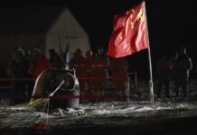 Chinese Capsule Returns To Earth Carrying Moon Rocks