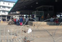 Watchdog Alarmed to See Healthy & Infected Migrant Workers Locked in Together