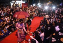 For Monarchy Reform Activist, Getting Hired Is All but Impossible Jatuporn Saeoueng during the "fashion walk" on Silom Road on Oct. 29, 2020.