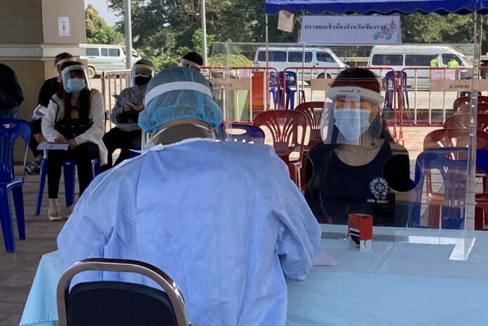 A woman receives a coronavirus test in Chiang Rai province on Dec. 7, 2020. A woman receives a coronavirus test in Chiang Rai province on Dec. 7, 2020.