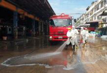 3 More Virus Cases Linked to Country’s Largest Seafood Market Workers disinfect a shrimp market in Samut Sakhon province on Dec. 18, 2020.