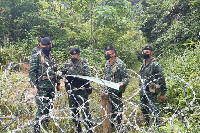 Security officers patrol the Thai-Myanmar border in Prachuap Khiri Khan province on Dec. 3, 2020. Security officers patrol the Thai-Myanmar border in Prachuap Khiri Khan province on Dec. 3, 2020.