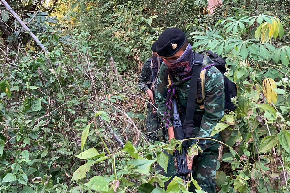 Security officers patrol the Thai-Myanmar border in Chiang Rai province on Dec. 5, 2020.
