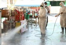 Exclusive: City Hall Scrubs 7-Eleven Stores From Coronavirus Travel History Health workers disinfect a fresh market in Nakhon Pathom province on Dec. 30, 2020.