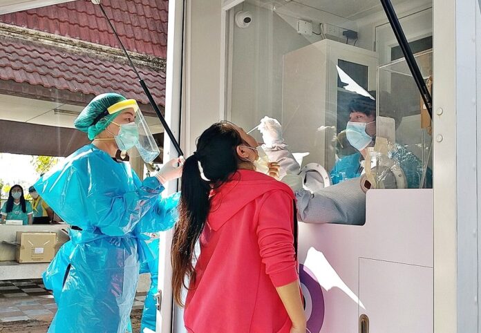 A woman receives a coronavirus test in Chonburi province on Jan. 20, 2021.